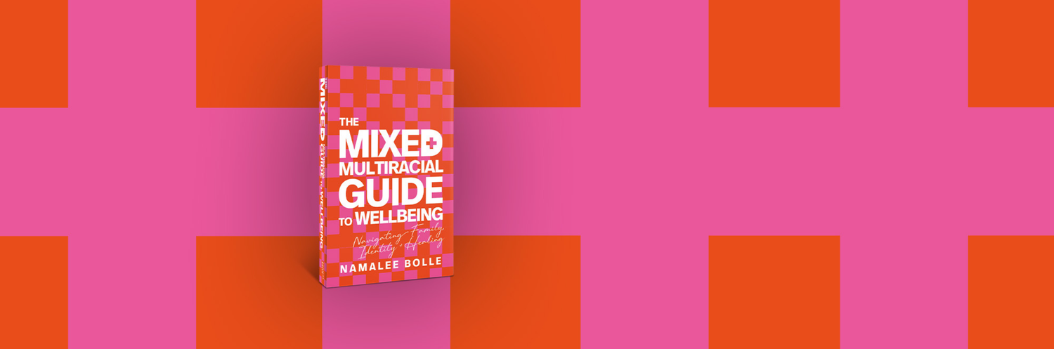 Book cover for The Mixed + Multiracial Guide to Wellbeing against a pink and red checkered background